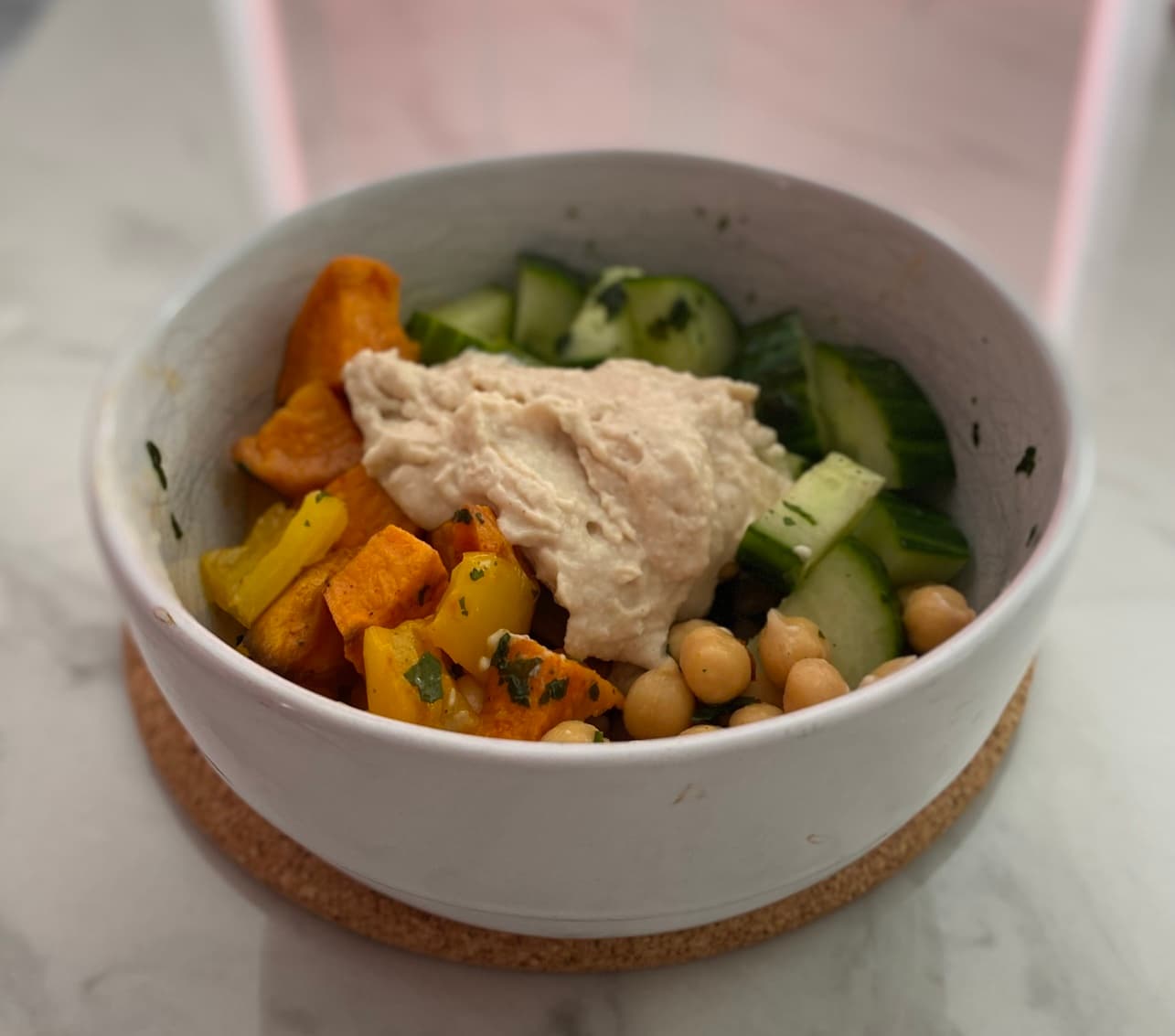 Sweet potato and hummus salad bowl