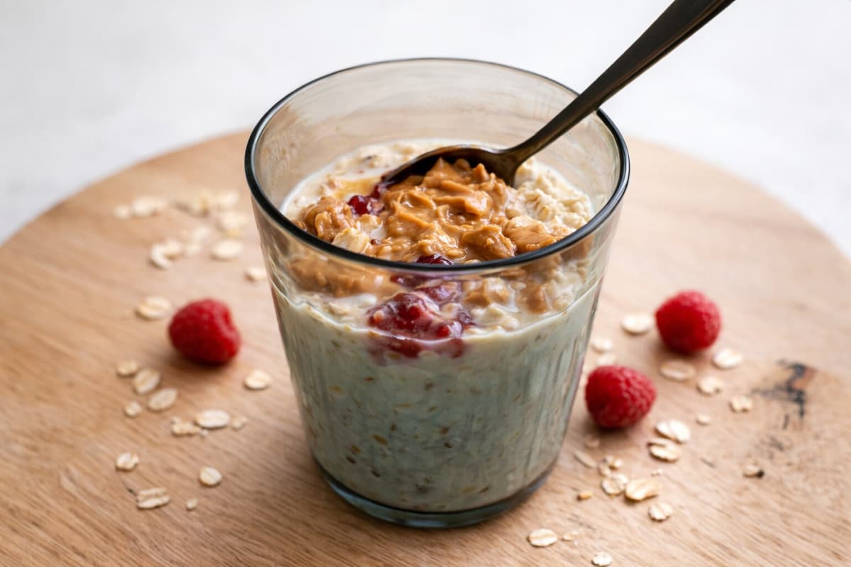 Creamy oats with peanut butter and raspberry compote