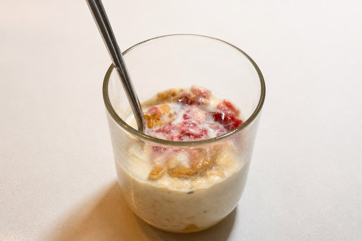 Creamy oats with peanut butter and strawberry compote