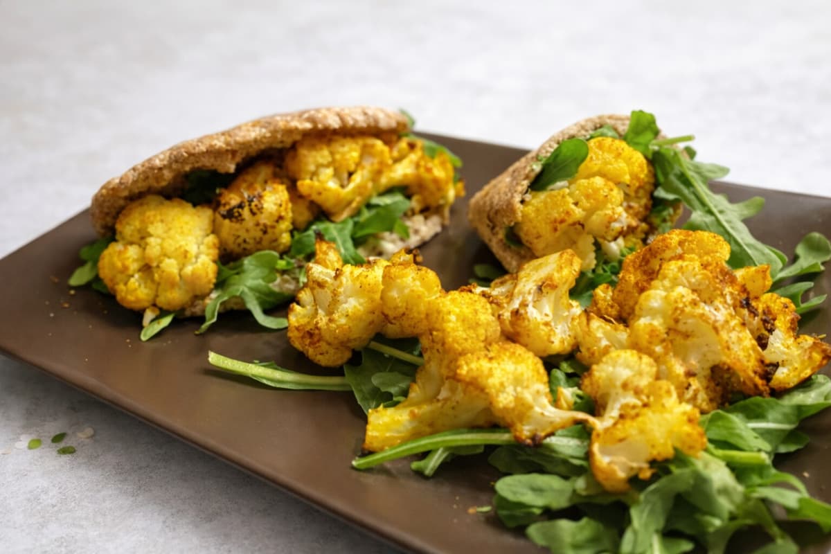 Roasted cauliflower and hummus pittas
