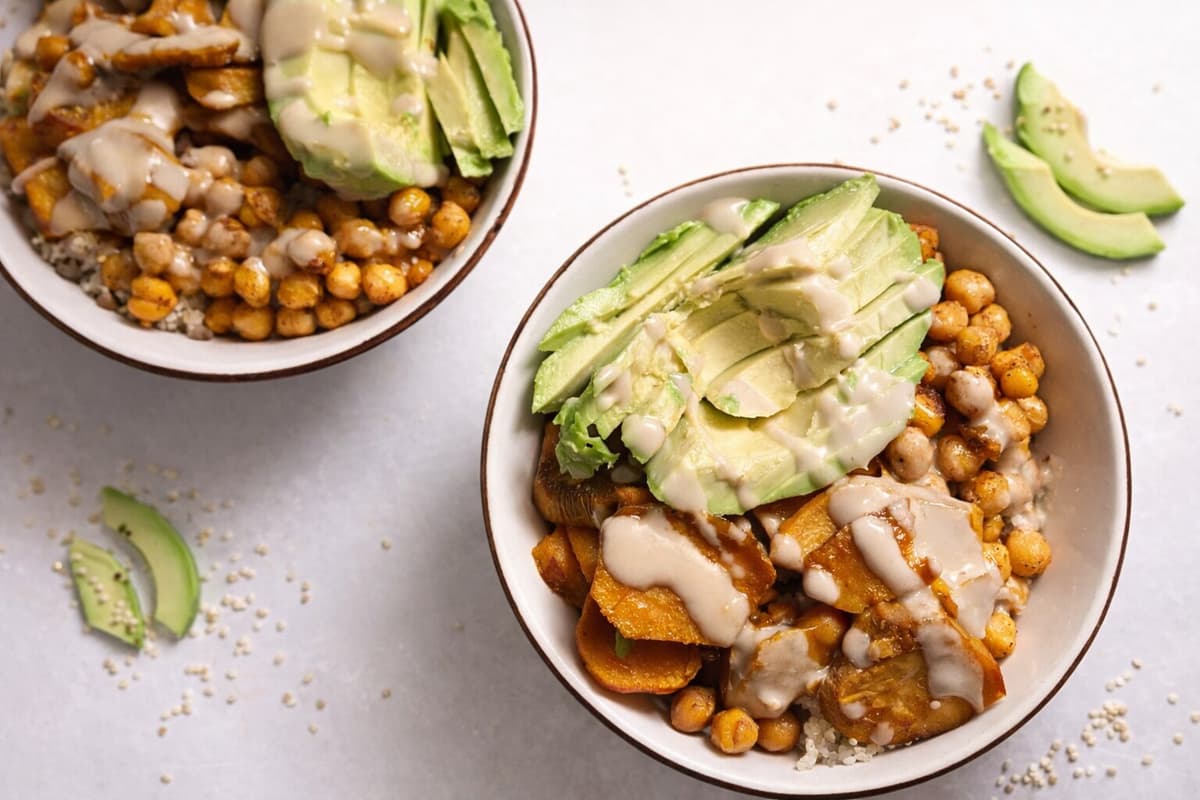 Sweet potato and chickpea grain bowl with tahini sauce